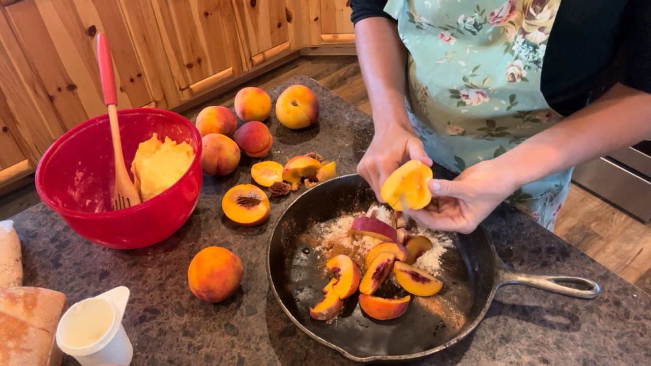 cutting peaches for sourdough peach cobbler