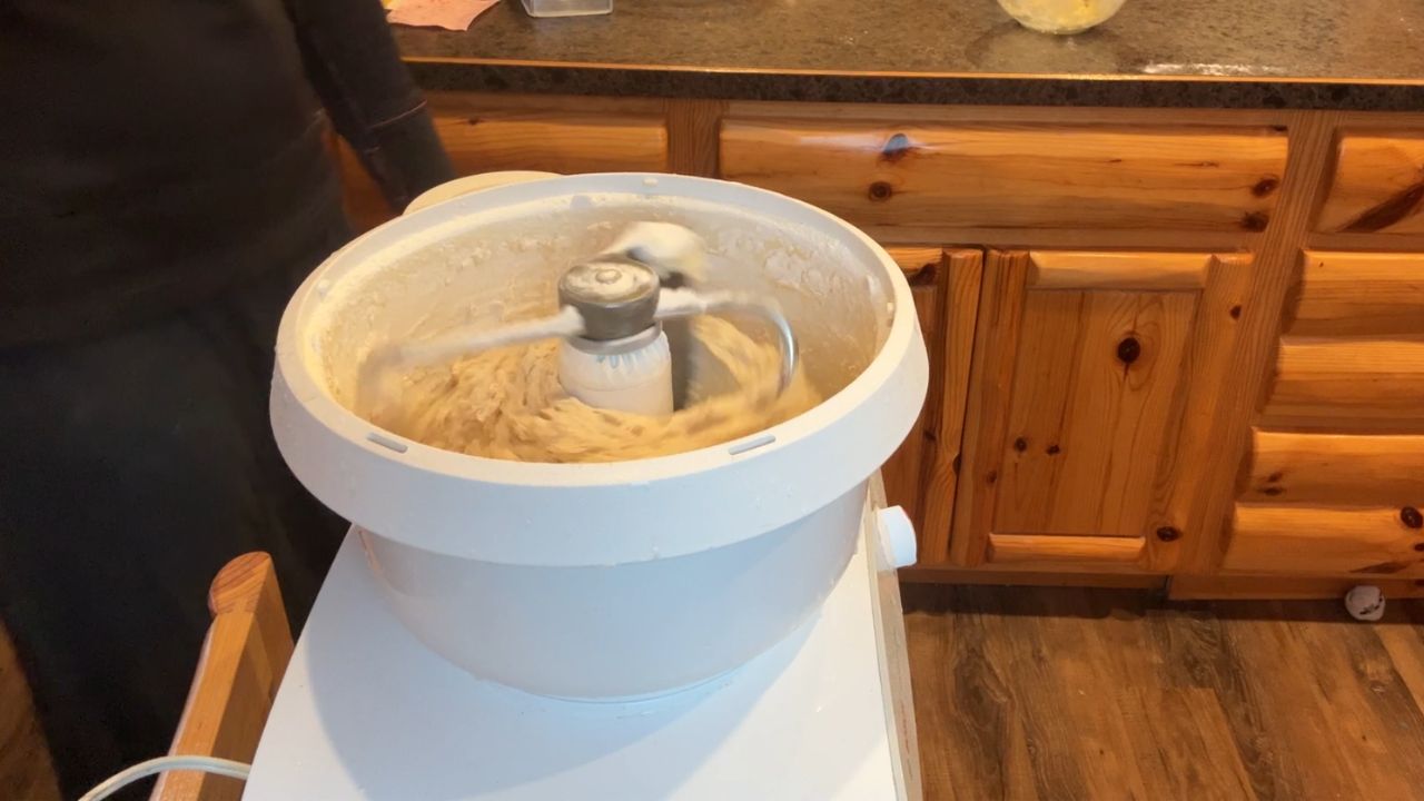 mixing up sourdough hamburger buns