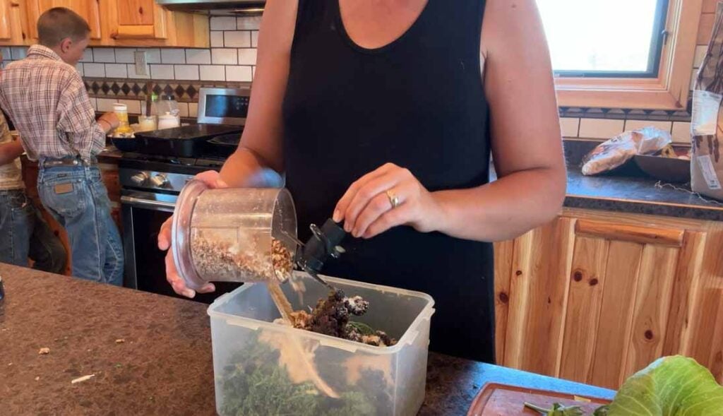 adding nuts to broccoli salad