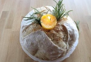 lit butter candle in sourdough