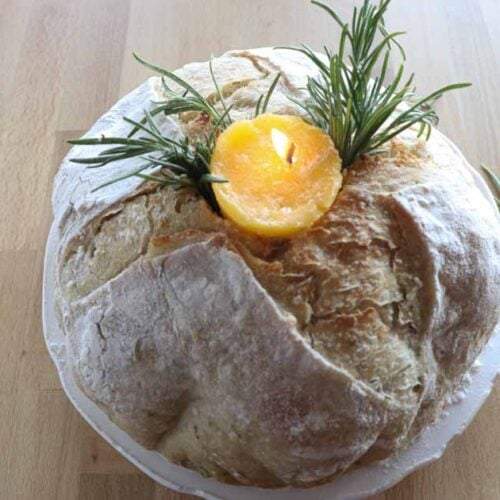lit butter candle in sourdough