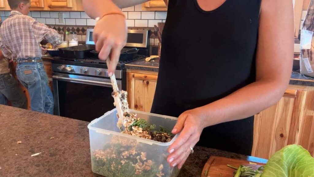 mixing up broccoli salad