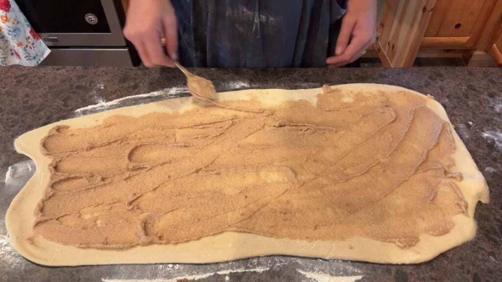 adding filling to sourdough cinnamon twist-