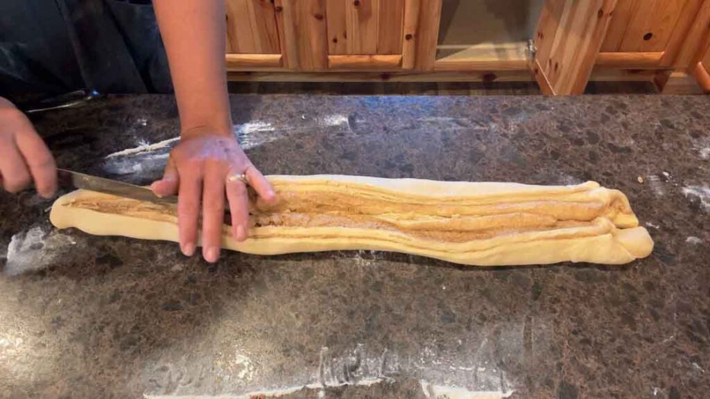 cutting sourdough cinnamon twist