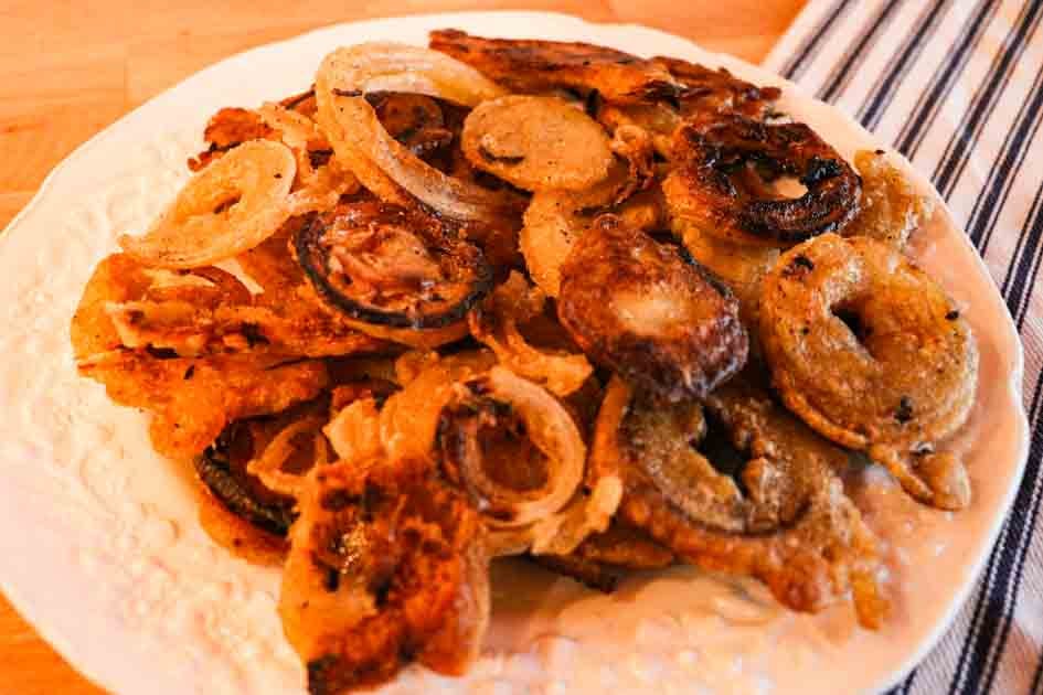 delicious plate of sourdough onion rings up close