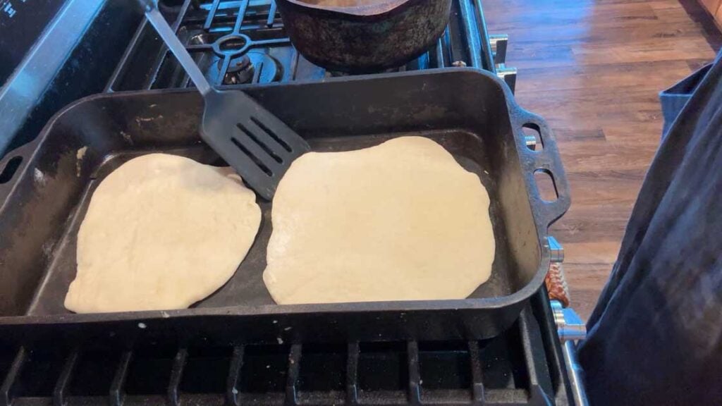 flipping sourdough tortillas