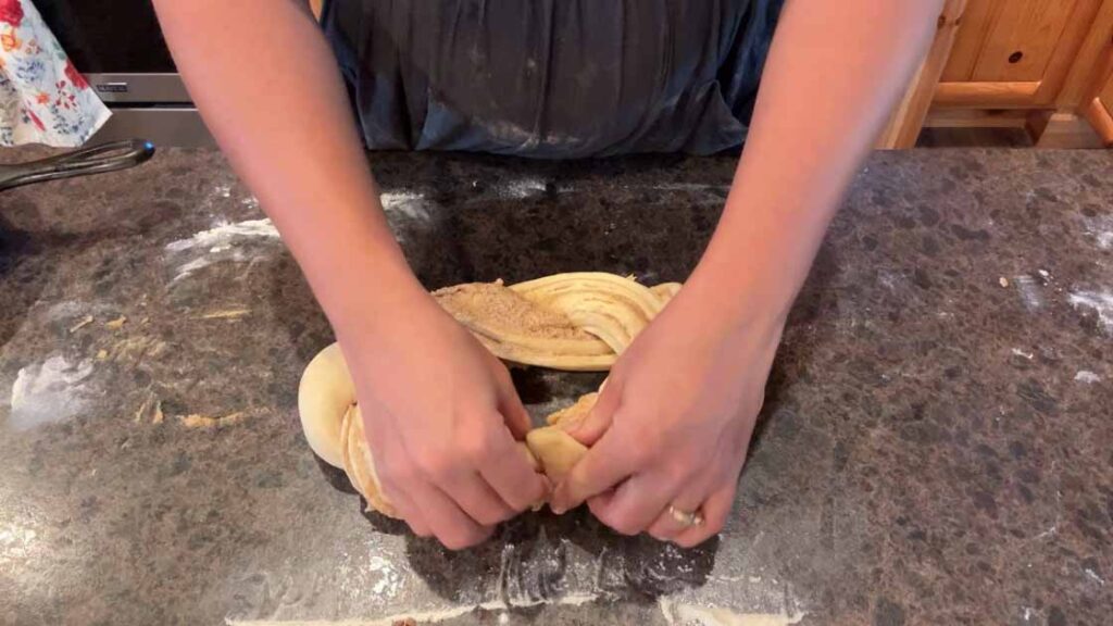 making a braided wreath out of sourdough cinnamon twist