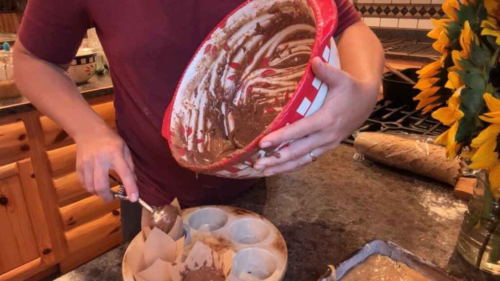 making chocolate zucchini sourdough muffins