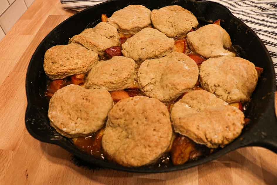 peach cobbler with sourdough biscuits