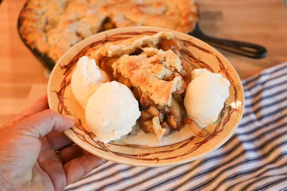 plate of deep dish apple pie and ice cream