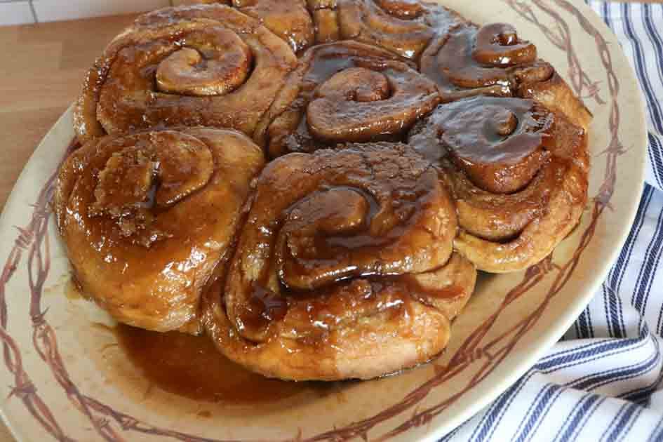 sourdough sticky buns on platter up close
