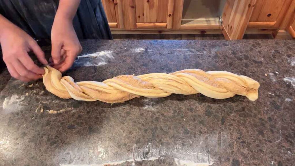 twisting sourdough cinnamon twist