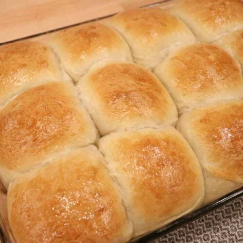 beautiful pan of sourdough dinner rolls