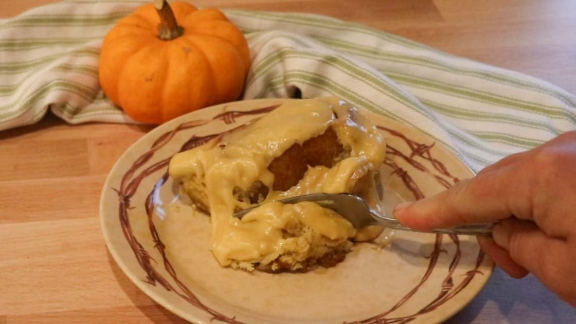 bite of sourdough pumpkin cinnamon rolls
