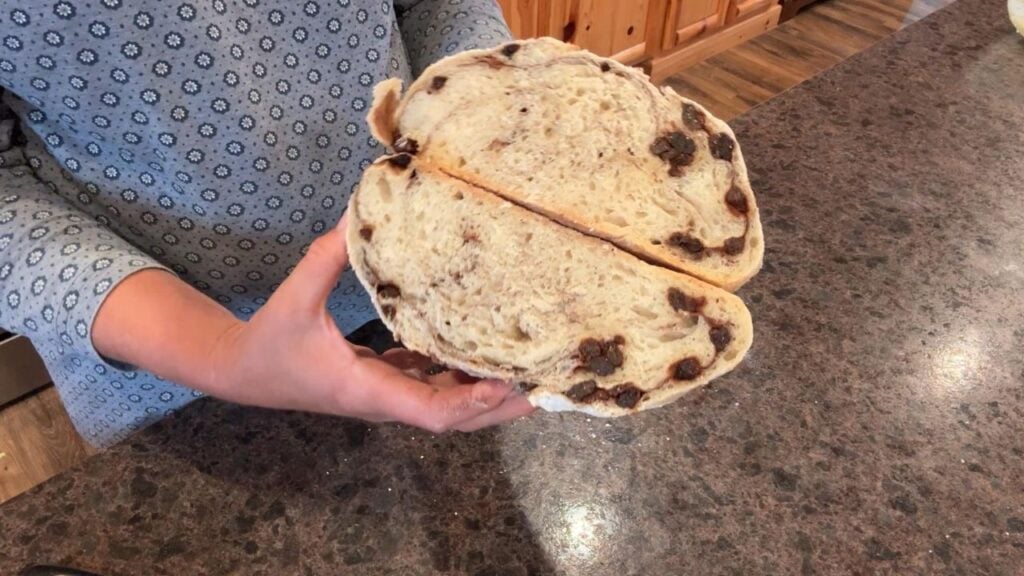 cutting cinnamon raisin sourdough bread