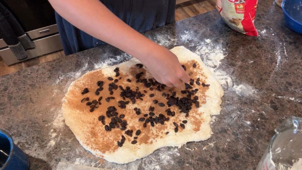 putting inclusions in cinnamon raisin sourdough bread