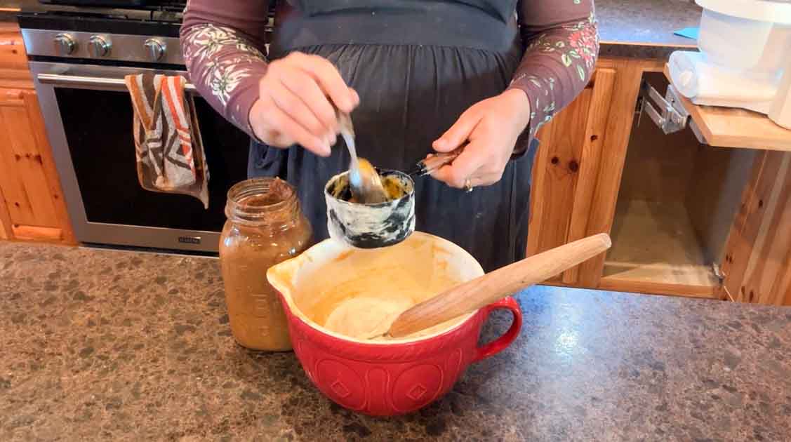 mixing up apple cake roll