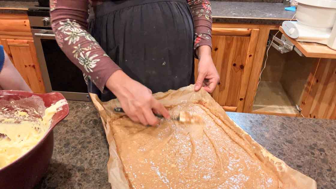 spreading out apple cake roll batter