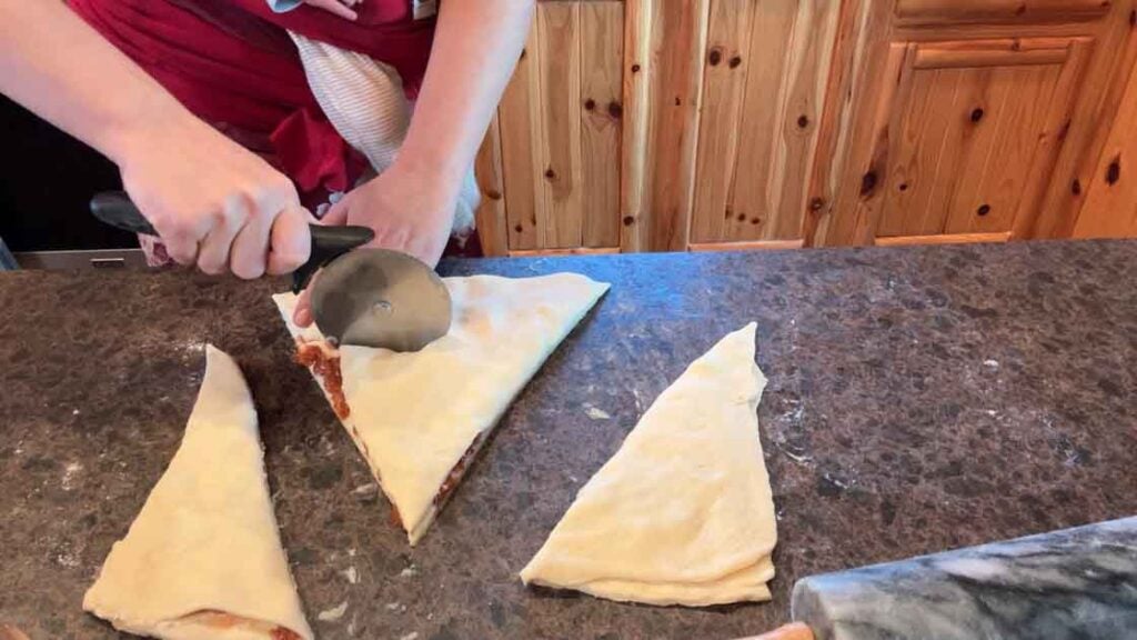 making cuts in puff pastry christmas tree