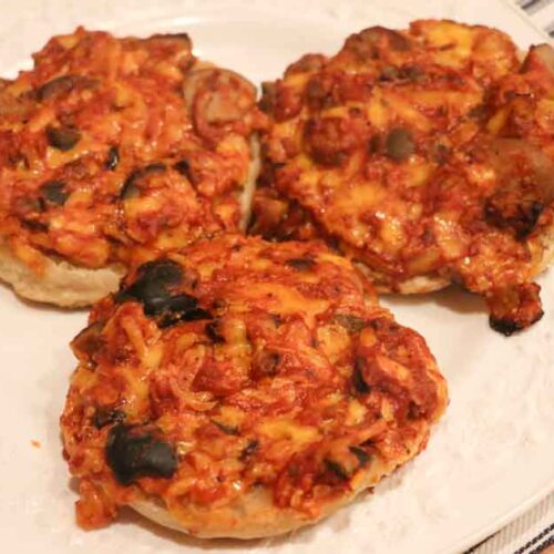 plate of english muffin pizzas up close