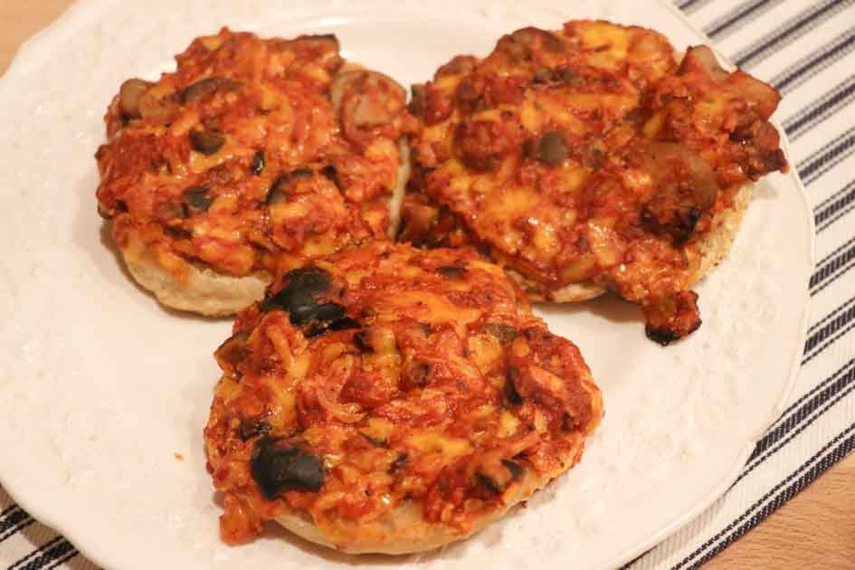 plate of english muffin pizzas up close