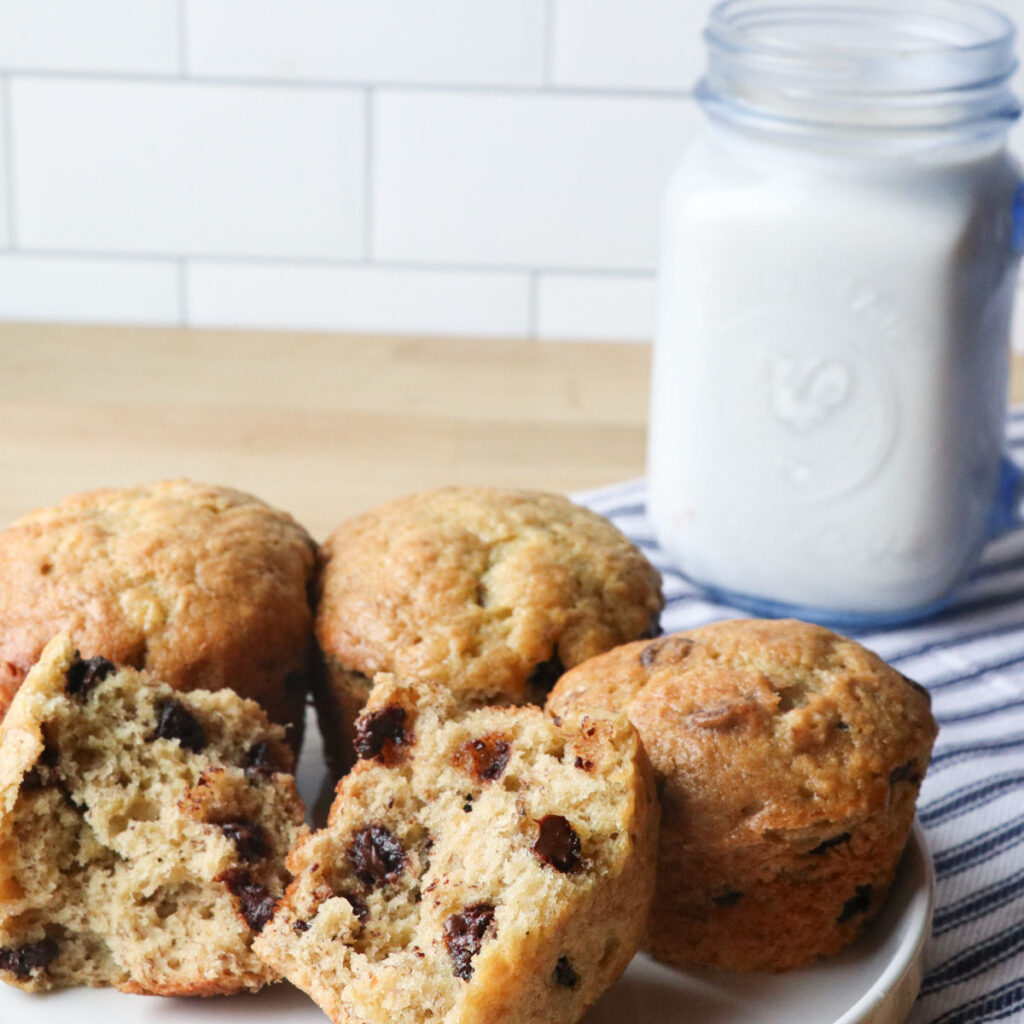 bite of chocolate chip banana muffins on towel feature