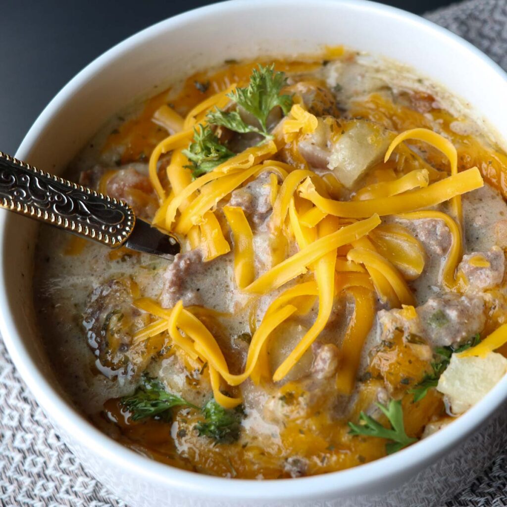 bowl of cheeseburger soup on towel square