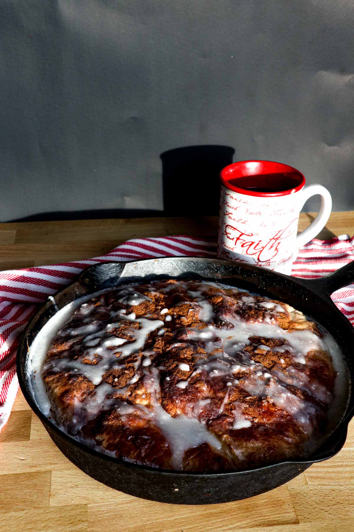 cinnamon roll focaccia with coffee on black