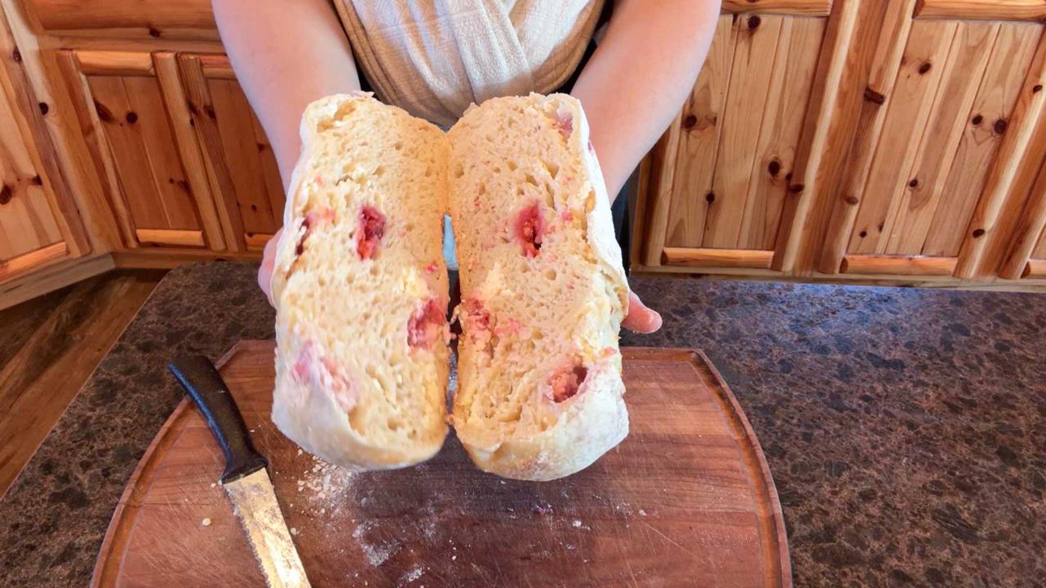 cut raspberry cheesecake sourdough