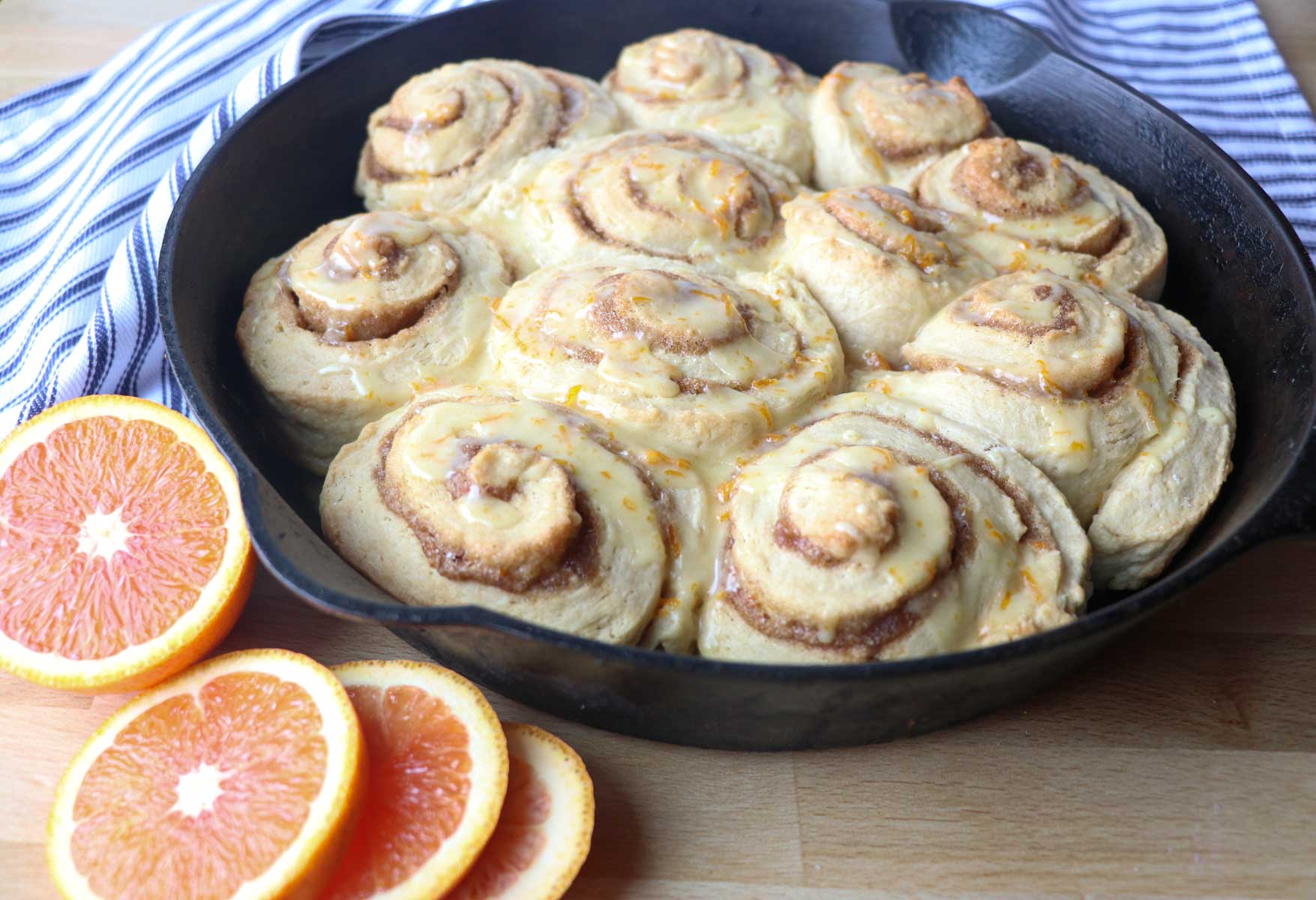 pan of sourdough orange rolls
