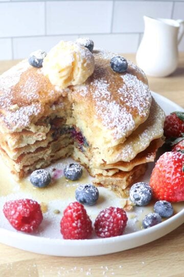 sourdough blueberry pancakes on a plate square