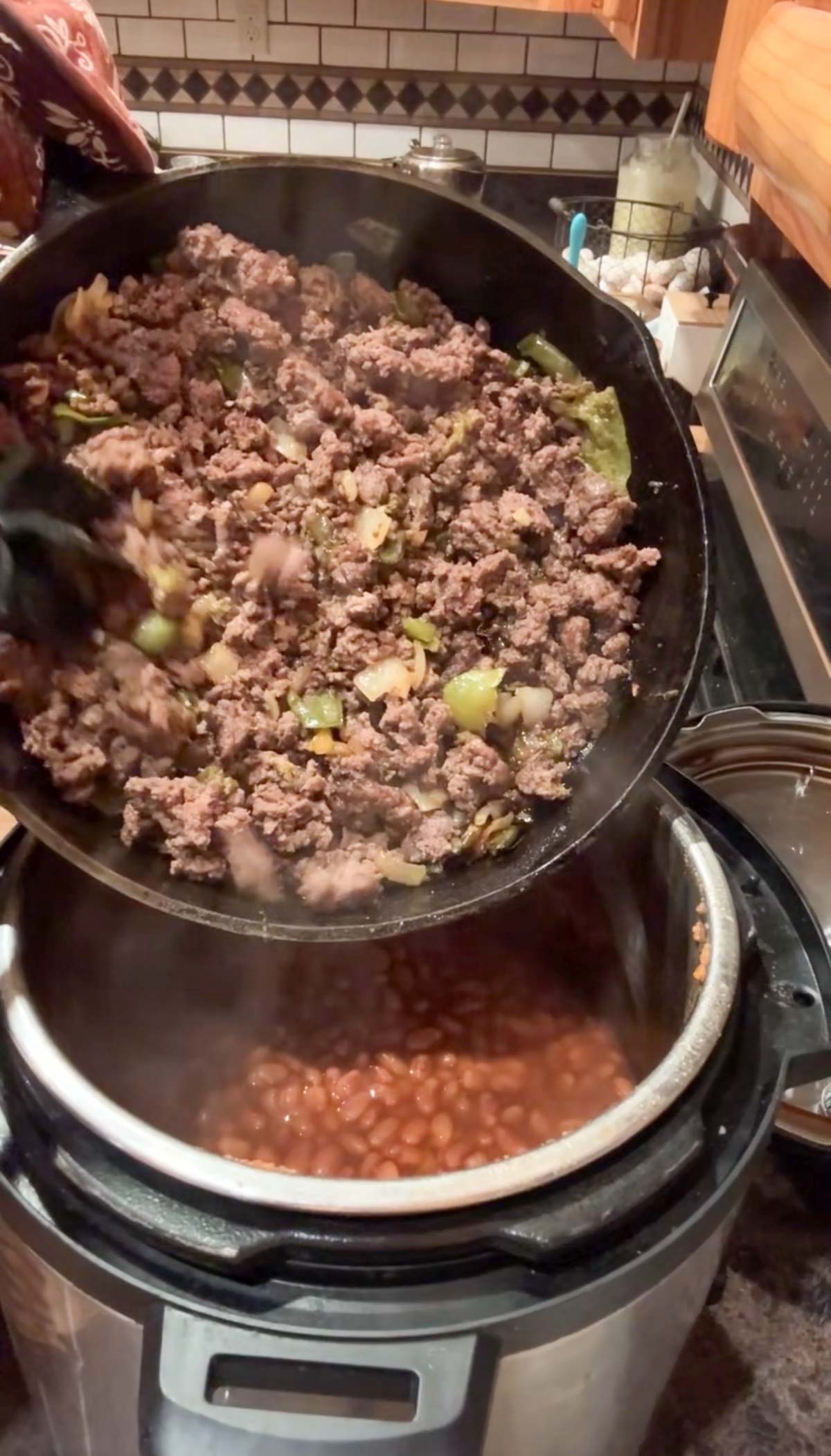 adding meat to chili