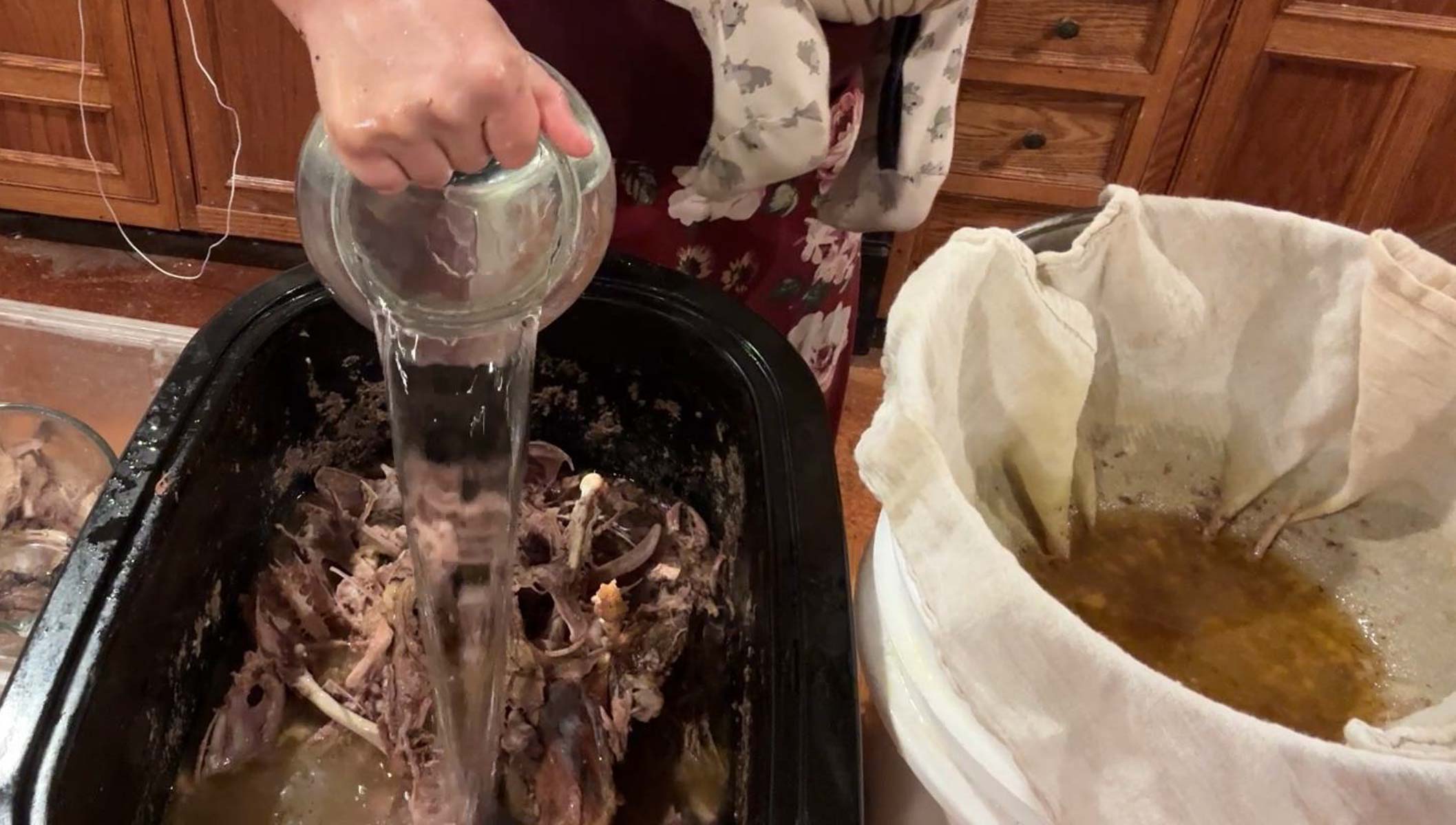 adding water to bones to make chicken broth