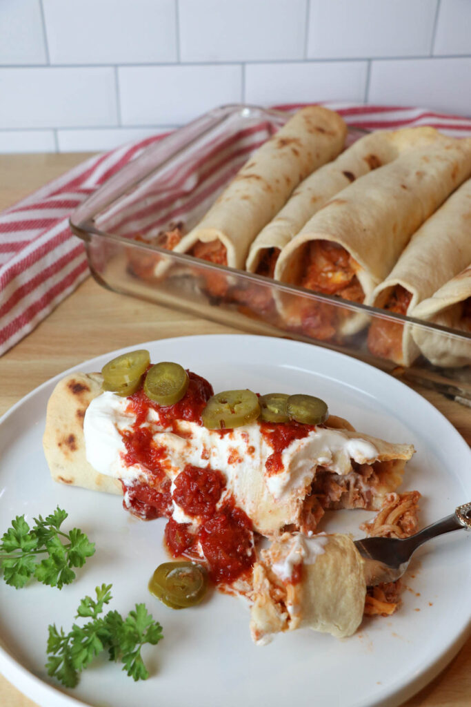 bite of chicken taquito vertical