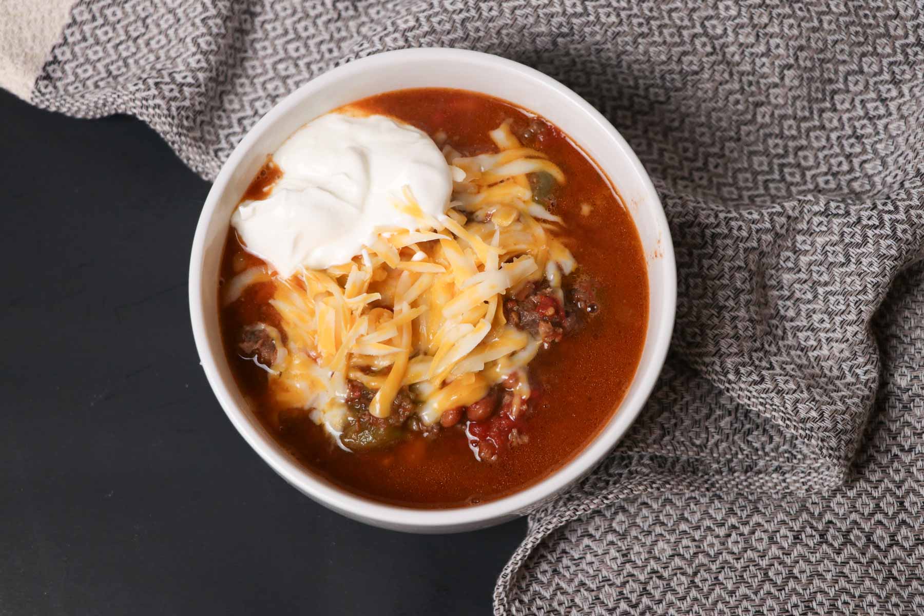 bowl of cowboy chili by towel
