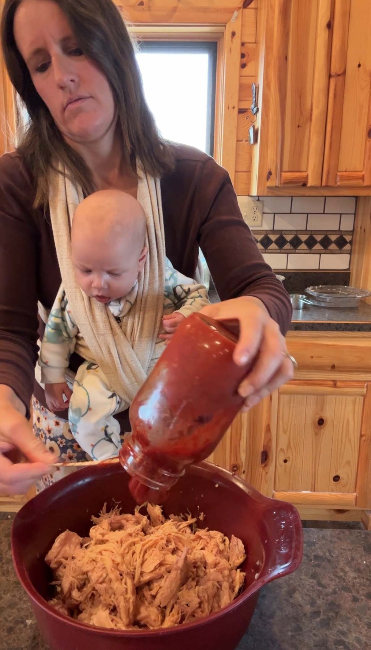 adding salsa to taquito filling