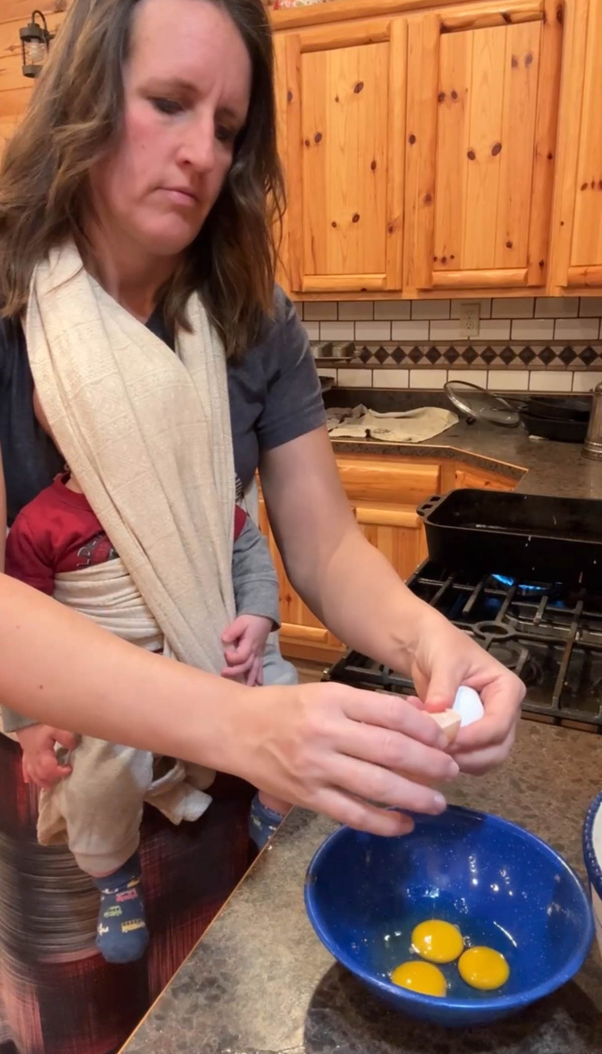 adding eggs to bowl for breading chicken fried steak