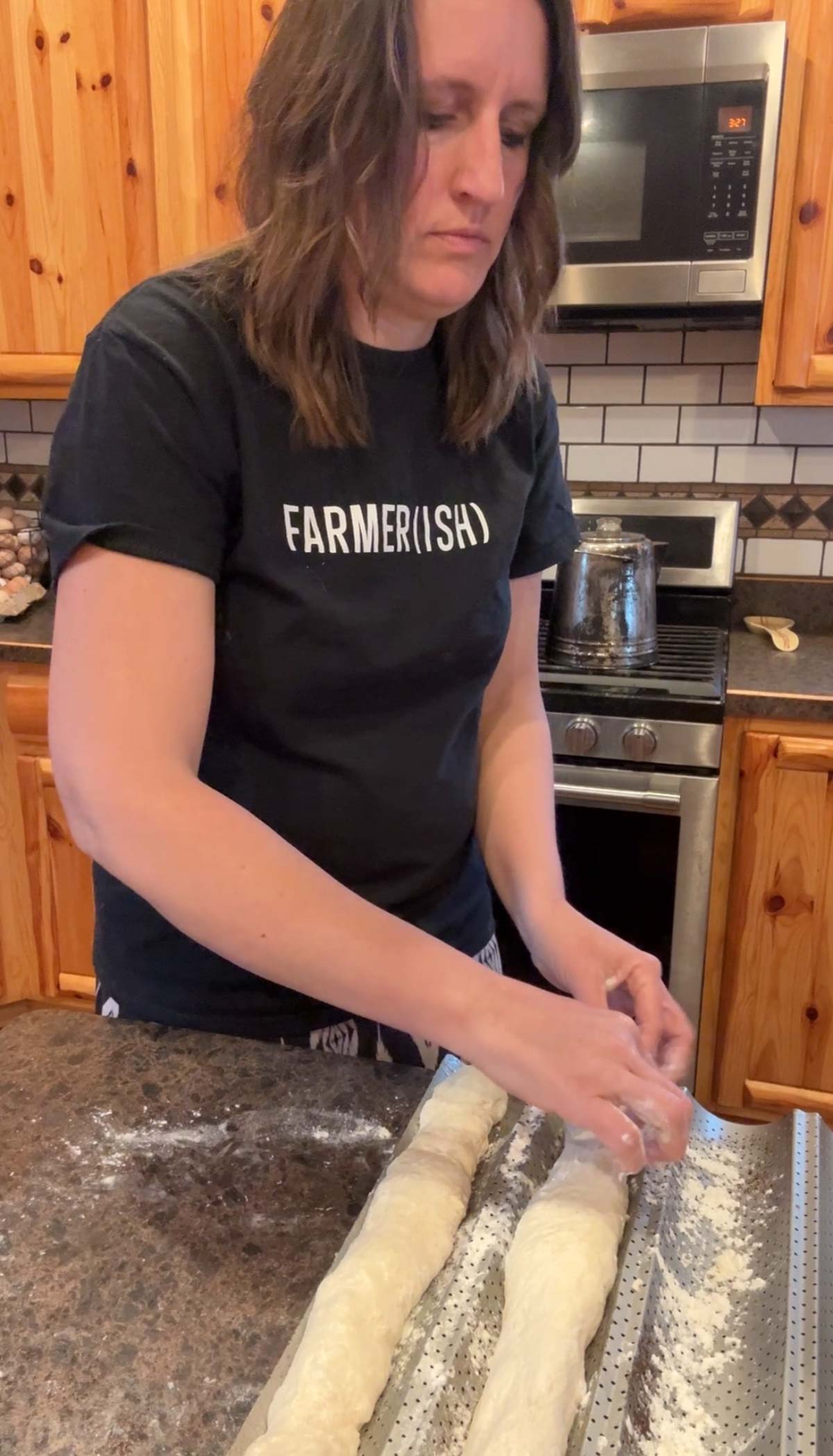 adding baguettes to baguette pan