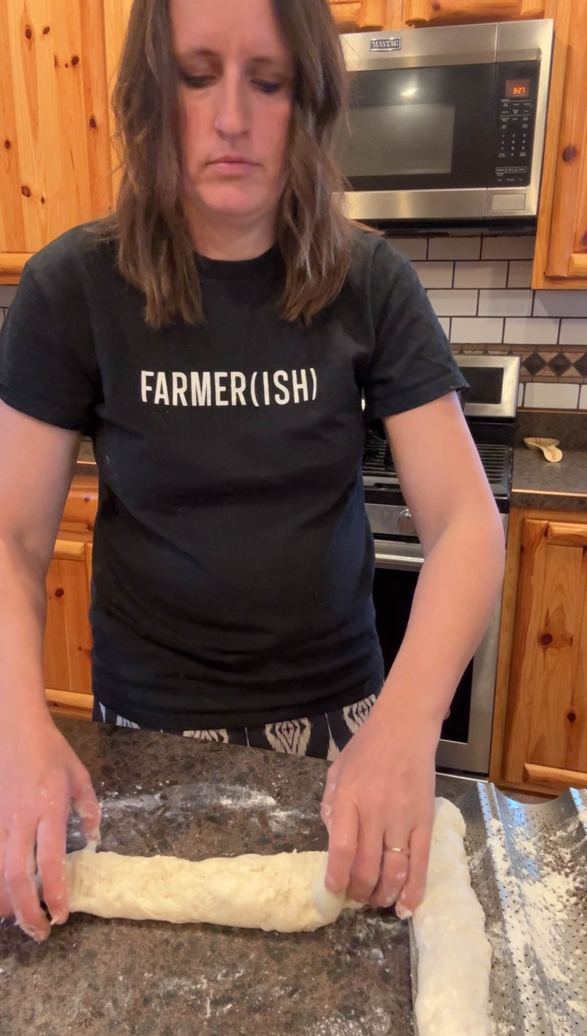shaping sourdough baguettes