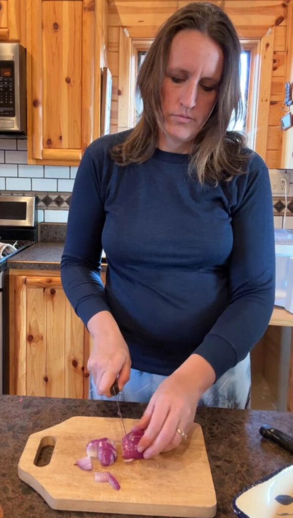 slicing purple onion