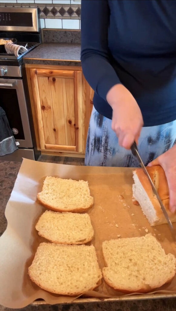 slicing sourdough bread