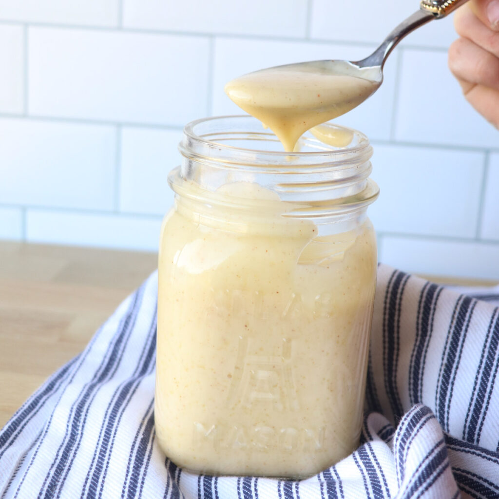 spoonful of miracle whip from a jar square