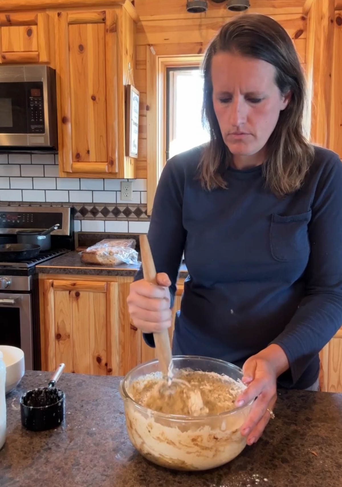 mixing up sourdough zucchini bread batter