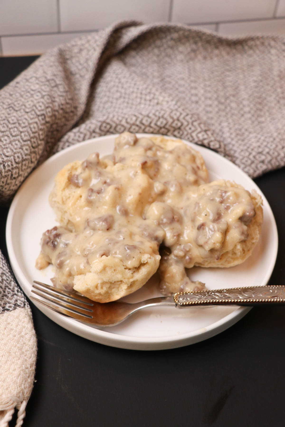 plate of sourdough gravy on biscuits
