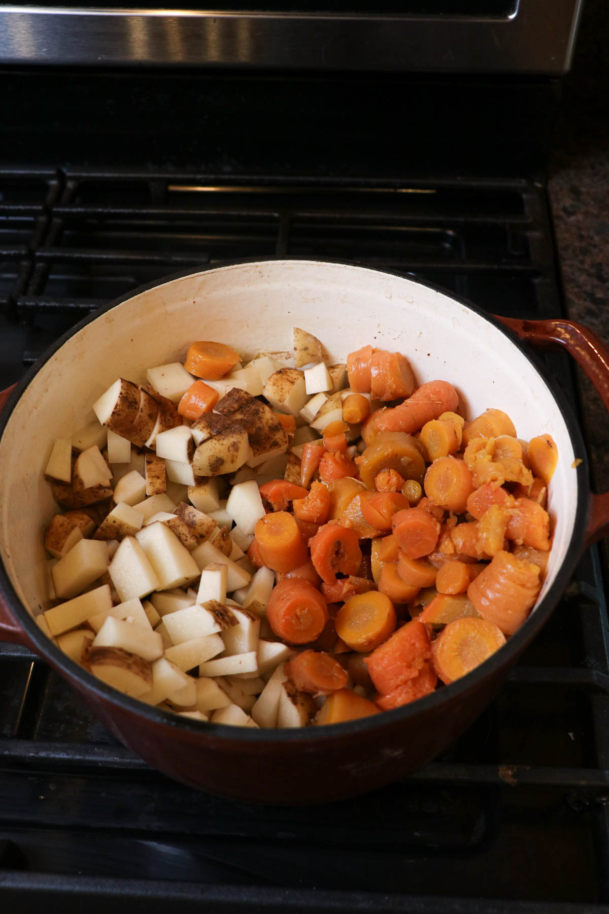 veggies in the pot for sauerkraut sausage soup